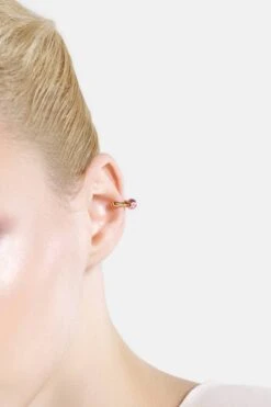 Casa Batlló Huggie Earcuff In Gold And Rose